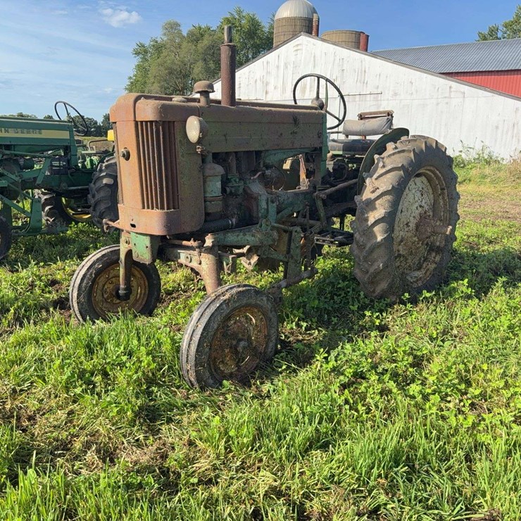 John Deere 320V Slant Steer