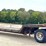 1997-trail-eze-dlx35tc53-53'-traveling-axle-flatbed-trailer-image-2