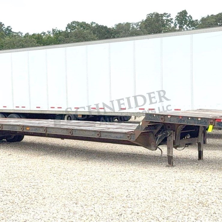 1997 Trail-Eze DLX35TC53 53' traveling axle flatbed trailer