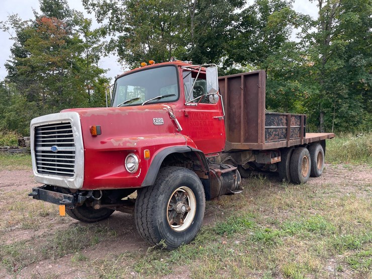 #5049-•-1980-ford-t/a-flatbed-dump-truck-(has-mi-title)-image-1