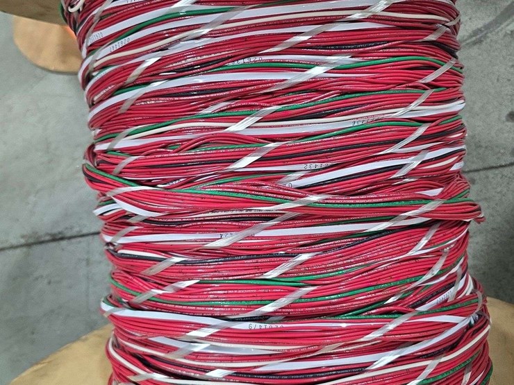 large-wooden-spool-with-cantinos-length-of-mulit-color-stranded-electrical-wire-with-red,-white,-black,-and-green-strands-image-3