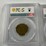 #40221-•-(4)-ground-zero-jamaican-1/2-pennies-graded-image-9