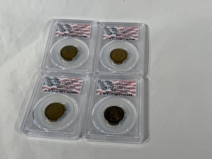 #40221-•-(4)-ground-zero-jamaican-1/2-pennies-graded-image-1