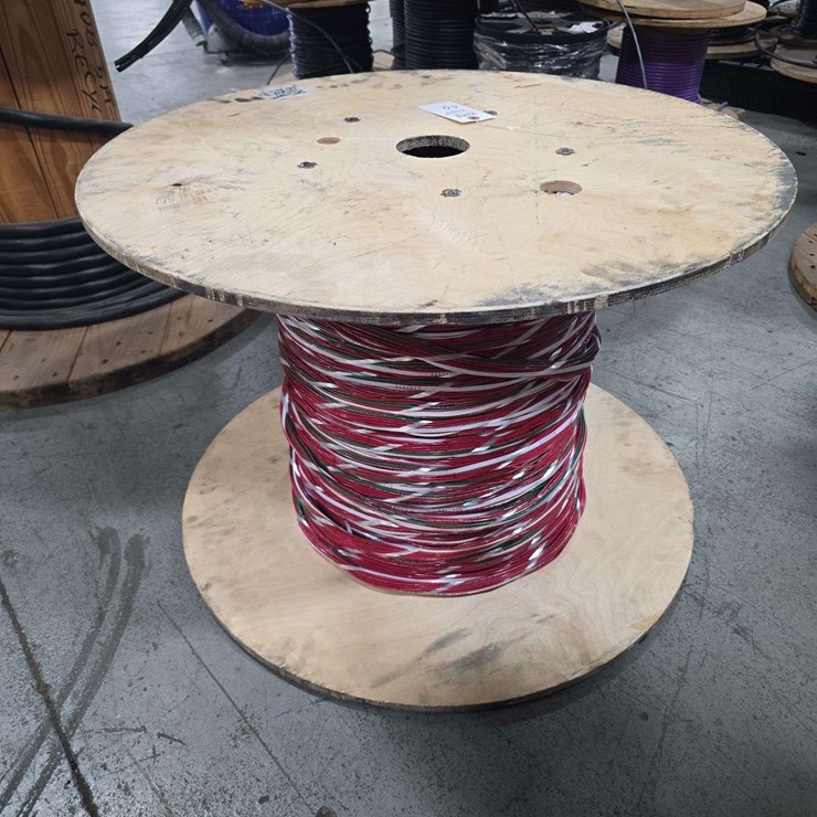 Large Wooden Spool with Cantinos length of Mulit color stranded electrical wire with red, white, black, and green strands