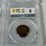 #40221-•-(4)-ground-zero-jamaican-1/2-pennies-graded-image-11