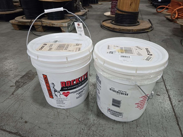 2-buckets-of-rock-tite,-1-new,-1-half-full-image-1