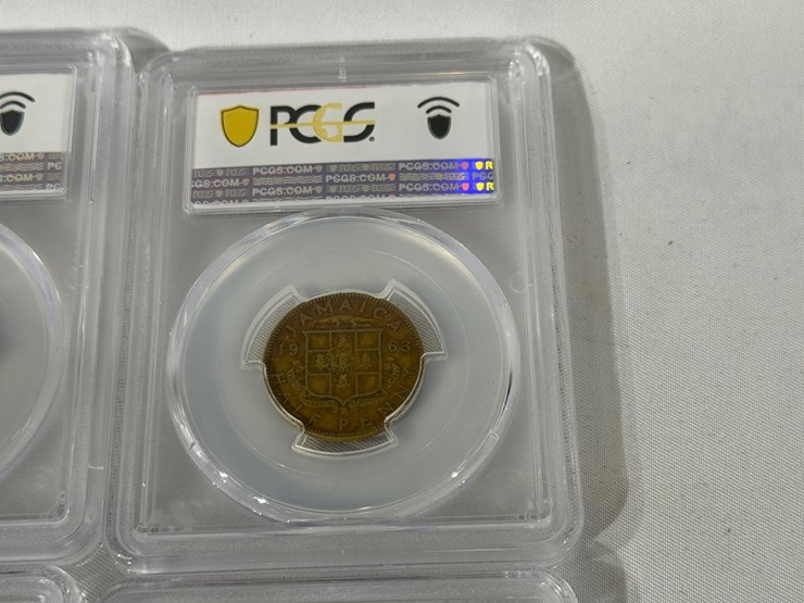 #40221-•-(4)-ground-zero-jamaican-1/2-pennies-graded-image-10
