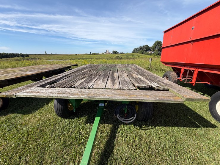 #2456-•-john-deere-1065a-running-gear-hydraulic-dump-flat-rack-image-2