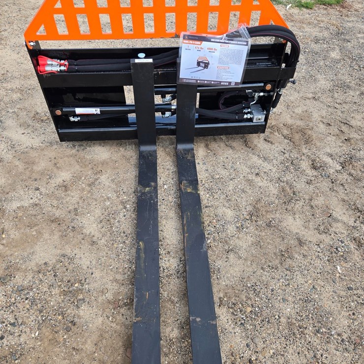 #2186 • (Edmore)wolverine hydraulic adjustable pallet forks