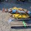 #1046-•-(5)-trucks-entering-and-overfhead-power-line-signs-and-stands-image-1