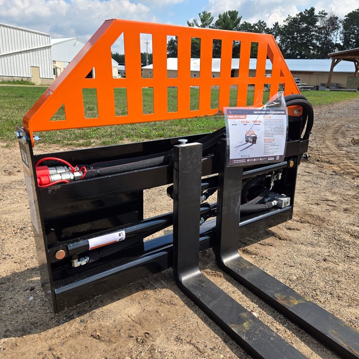 #2187 • (Edmore)wolverine hydraulic adjustable pallet forks