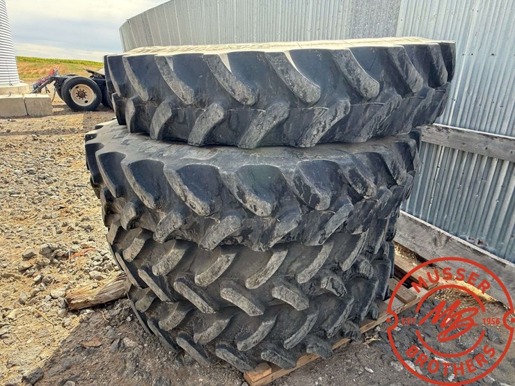 (4)-firestone-380/90r46-tires-(80%)-on-12-hole-jd-wheels-image-2