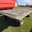 #2456-•-john-deere-1065a-running-gear-hydraulic-dump-flat-rack-image-4