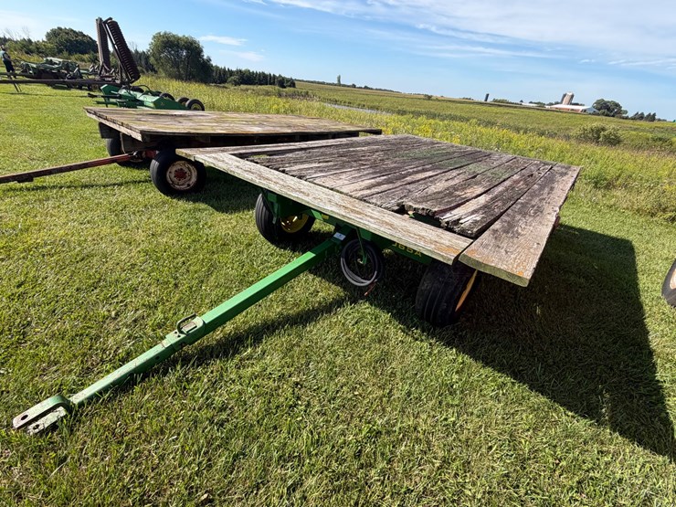 #2456-•-john-deere-1065a-running-gear-hydraulic-dump-flat-rack-image-1