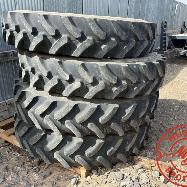 (4) Firestone 380/90R46 Tires (80%) on 12-Hole JD Wheels