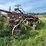 #1329-•-adam-leaning-steel-wheeled-grader-image-6