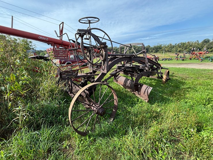 #1329-•-adam-leaning-steel-wheeled-grader-image-6