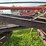 #1329-•-adam-leaning-steel-wheeled-grader-image-20