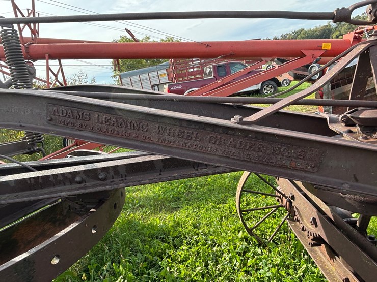 #1329-•-adam-leaning-steel-wheeled-grader-image-20