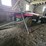 #8721-•-john-deere-running-gear-and-flat-rack-image-1
