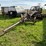 #1329-•-adam-leaning-steel-wheeled-grader-image-1