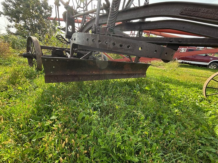 #1329-•-adam-leaning-steel-wheeled-grader-image-15