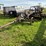 #1329-•-adam-leaning-steel-wheeled-grader-image-2