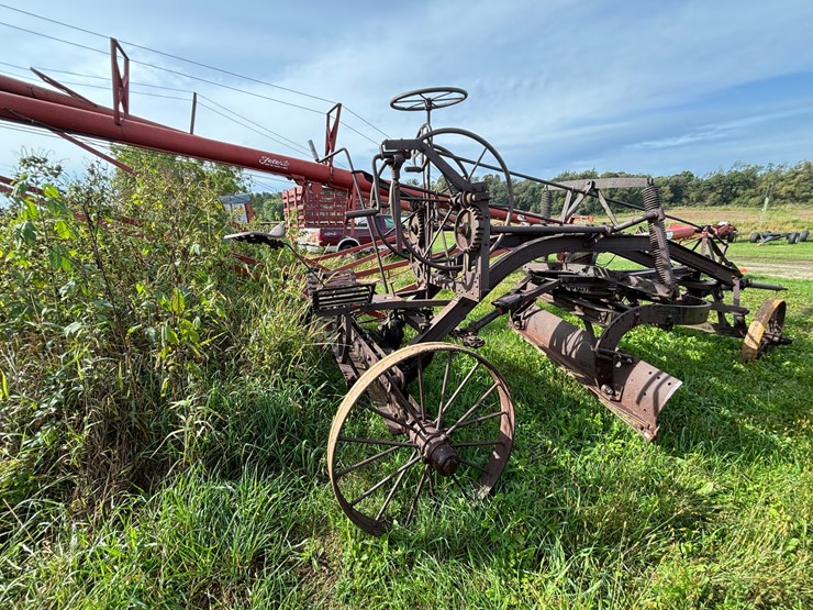 #1329-•-adam-leaning-steel-wheeled-grader-image-7