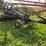 #1329-•-adam-leaning-steel-wheeled-grader-image-4