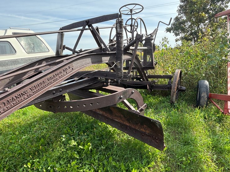 #1329-•-adam-leaning-steel-wheeled-grader-image-28