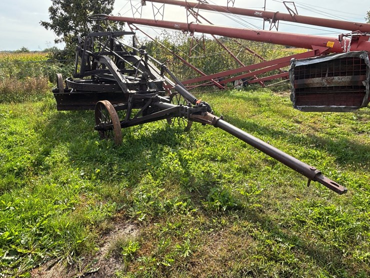 #1329-•-adam-leaning-steel-wheeled-grader-image-3