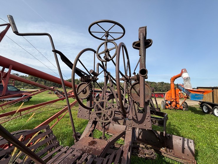 #1329-•-adam-leaning-steel-wheeled-grader-image-11