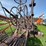 #1329-•-adam-leaning-steel-wheeled-grader-image-10