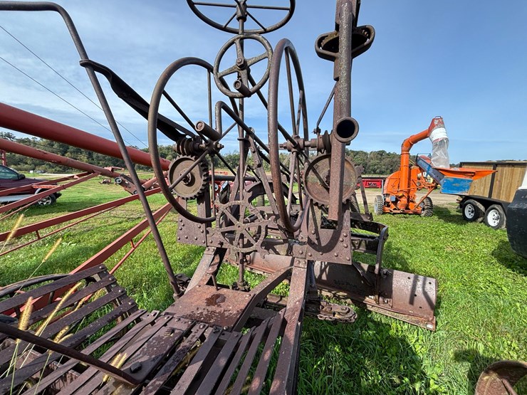 #1329-•-adam-leaning-steel-wheeled-grader-image-10