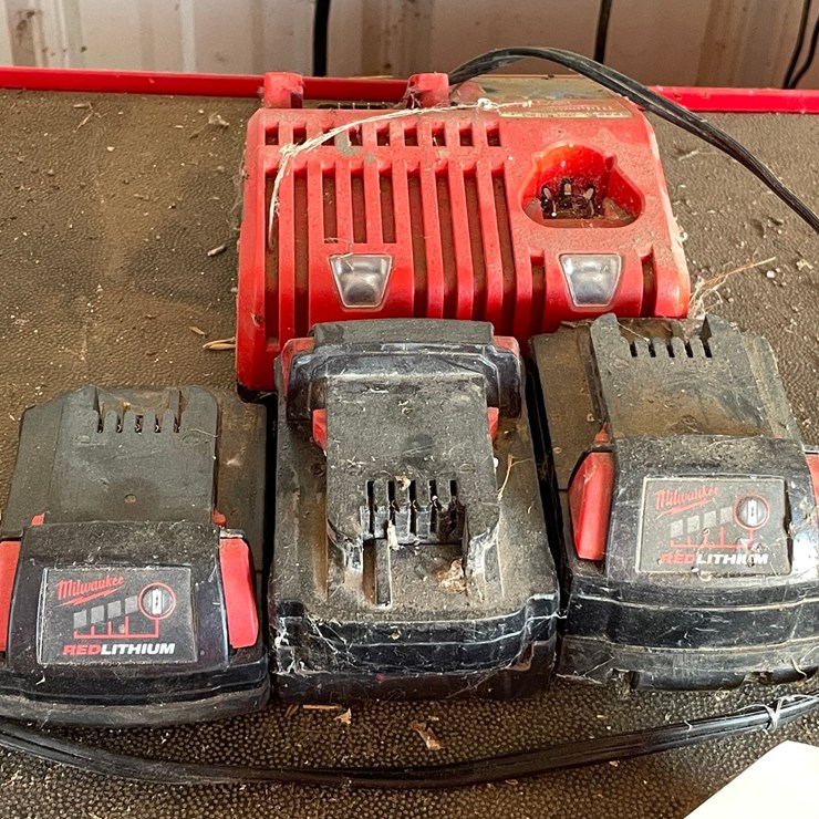 #5512 • (3) Milwaukee 18v Batteries and Charger