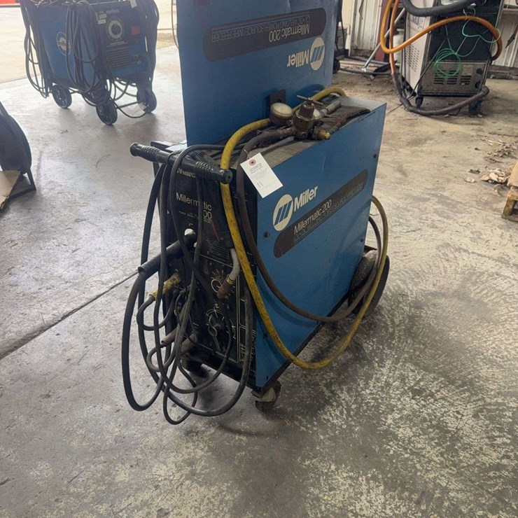 Millermatic 200 CV/DC arc welding power source with wire feeder, wire feeder needs work, with leads