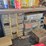 metal-workbenches-with-integrated-storage-and-assorted-automotive-tools-image-5
