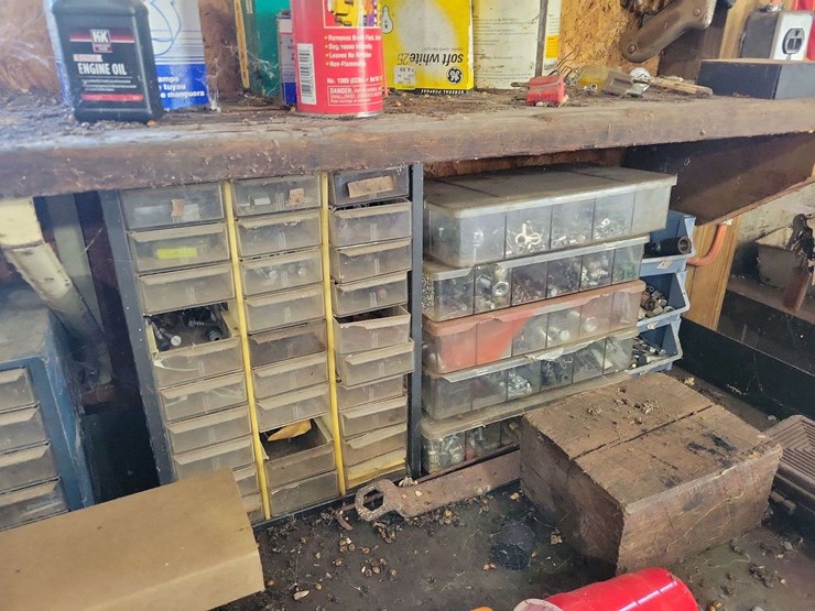 metal-workbenches-with-integrated-storage-and-assorted-automotive-tools-image-5