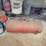 metal-workbenches-with-integrated-storage-and-assorted-automotive-tools-image-7