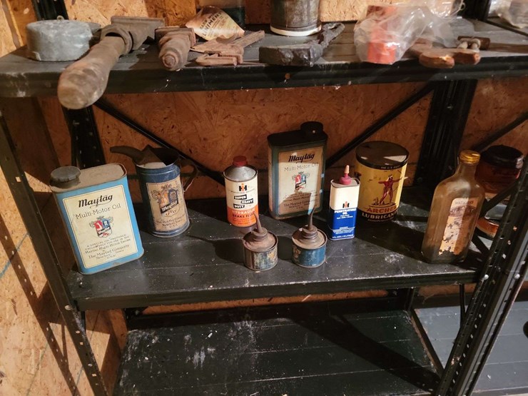 assorted-collection-of-farm-and-tractor-memorabilia,-oil-cans,-and-repair-parts-image-2