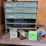 shop-shelf-contents-including-curtis-small-parts-cabinet,-calculator,-hardware,-and-miscellaneous-tools-image-2