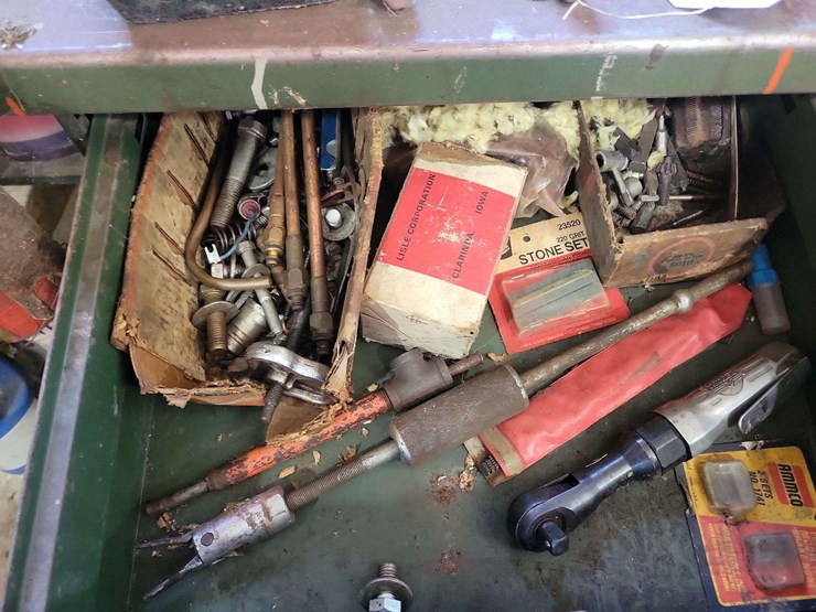 metal-workbenches-with-integrated-storage-and-assorted-automotive-tools-image-8