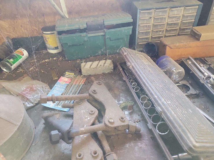 metal-workbenches-with-integrated-storage-and-assorted-automotive-tools-image-2