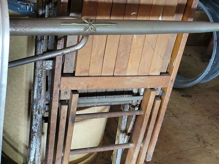 loft-storage-assortment-with-tractor-parts,-furniture,-and-containers-image-8