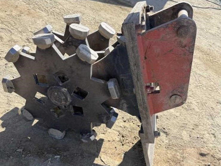 cat-excavator-compaction-wheel-image-1