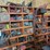 shop-storage-shelving-unit-with-contents-including-tractor-parts,-hoses,-and-hardware-image-1