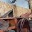 shop-storage-shelving-unit-with-contents-including-tractor-parts,-hoses,-and-hardware-image-6