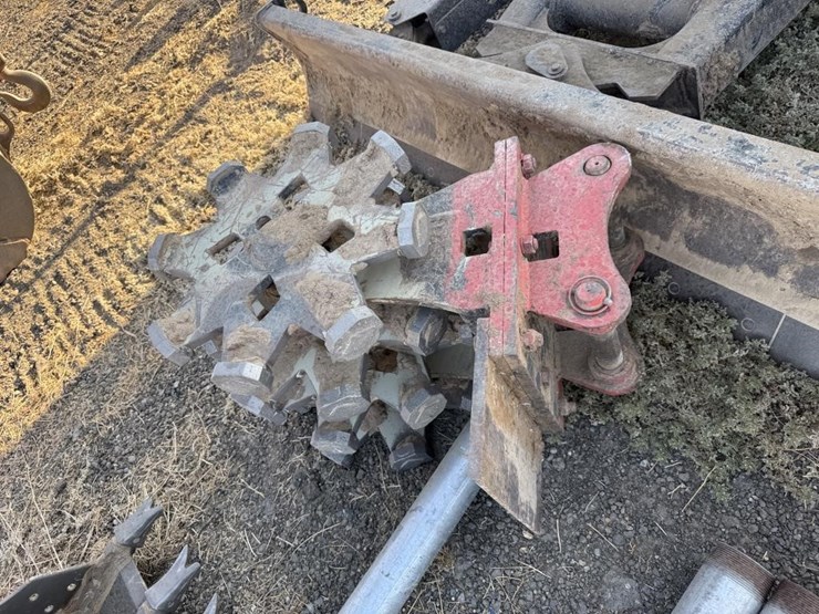 cat-mini-excavator-compaction-wheel-image-1