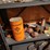 assorted-collection-of-farm-and-tractor-memorabilia,-oil-cans,-and-repair-parts-image-4
