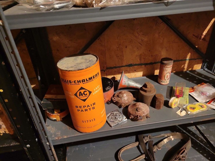 assorted-collection-of-farm-and-tractor-memorabilia,-oil-cans,-and-repair-parts-image-4